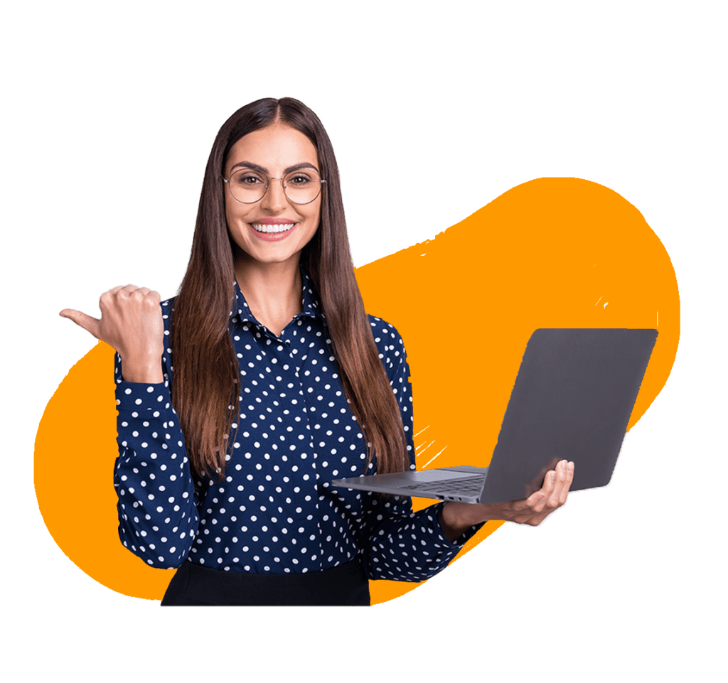 A woman in a polka dot blouse holding a laptop in one hand while gesturing with her other hand, smiling at the camera. She is against a orange background.