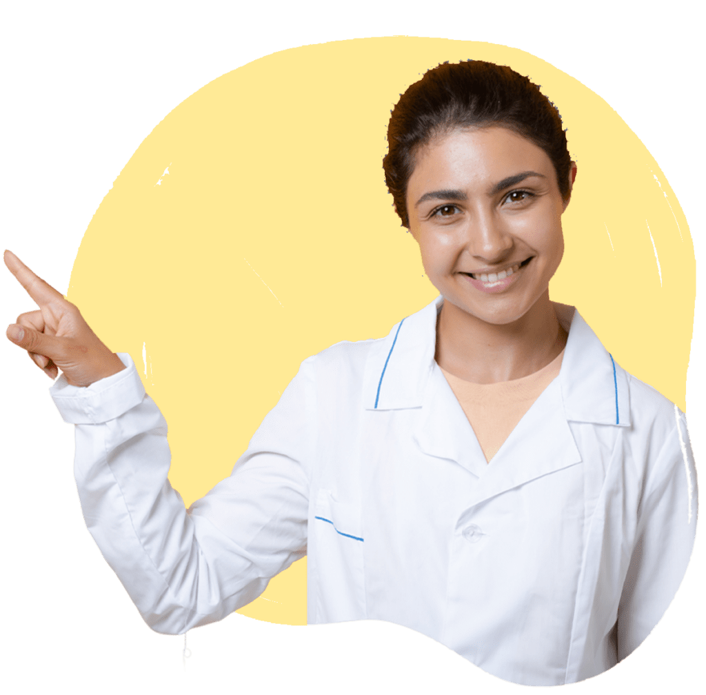 A healthcare professional in a white lab coat smiling and pointing upwards, with an yellow background.