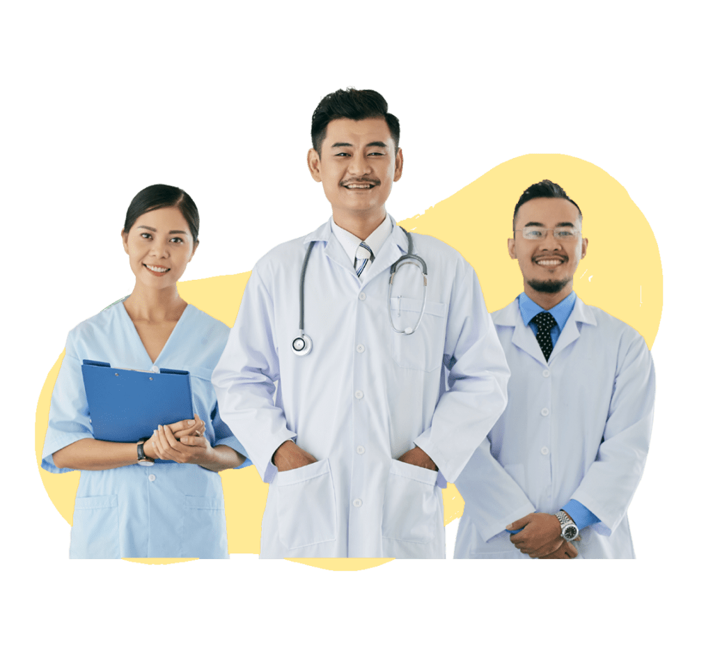 Three healthcare professionals smiling and standing together in a yellow background. One woman in scrubs holding a clipboard, and two men in lab coats with stethoscopes.